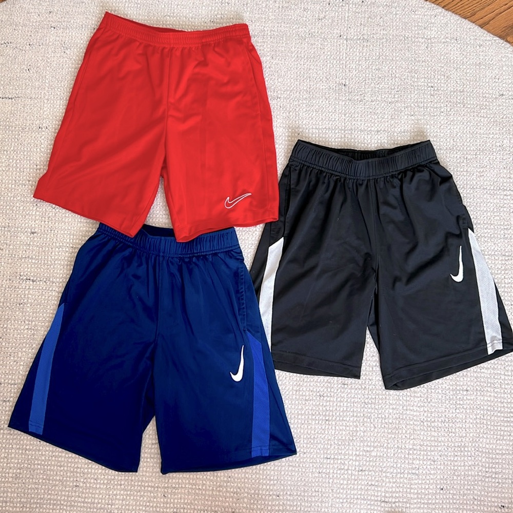 Three pairs of Nike shorts, like new, boys L